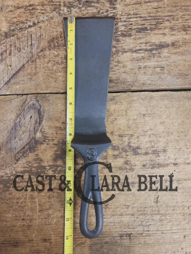 Custom made from a Raised #8 Lodge Arc Logo Cast Iron Skillet Spatula. A collectorsâ prize to own repurposed for a