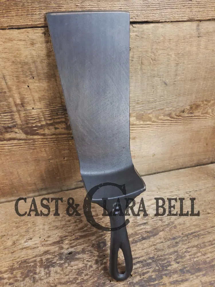 Custom made from a Raised #8 Lodge Arc Logo Cast Iron Skillet Spatula. A collectorsβ prize to own repurposed for a