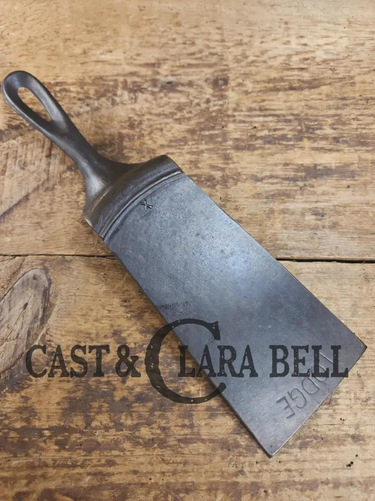 Custom made from a Raised #8 Lodge Arc Logo Cast Iron Skillet Spatula. A collectorsβ prize to own repurposed for a