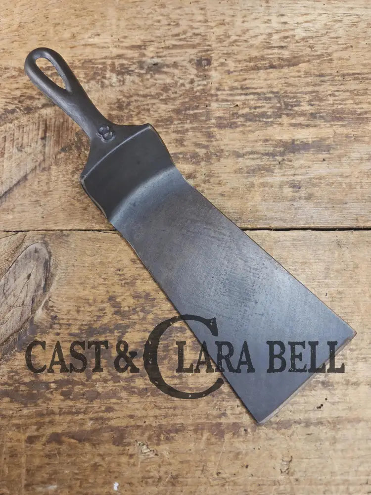 Custom made from a Raised #8 Lodge Arc Logo Cast Iron Skillet Spatula. A collectorsβ prize to own repurposed for a