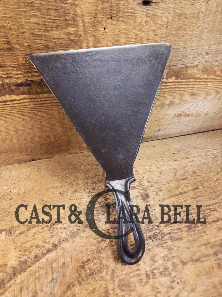 Custom made one of a kind 1800βs #8 Cast Iron Griddle Repurposed into triangular grill spatula. Perfect for the Home