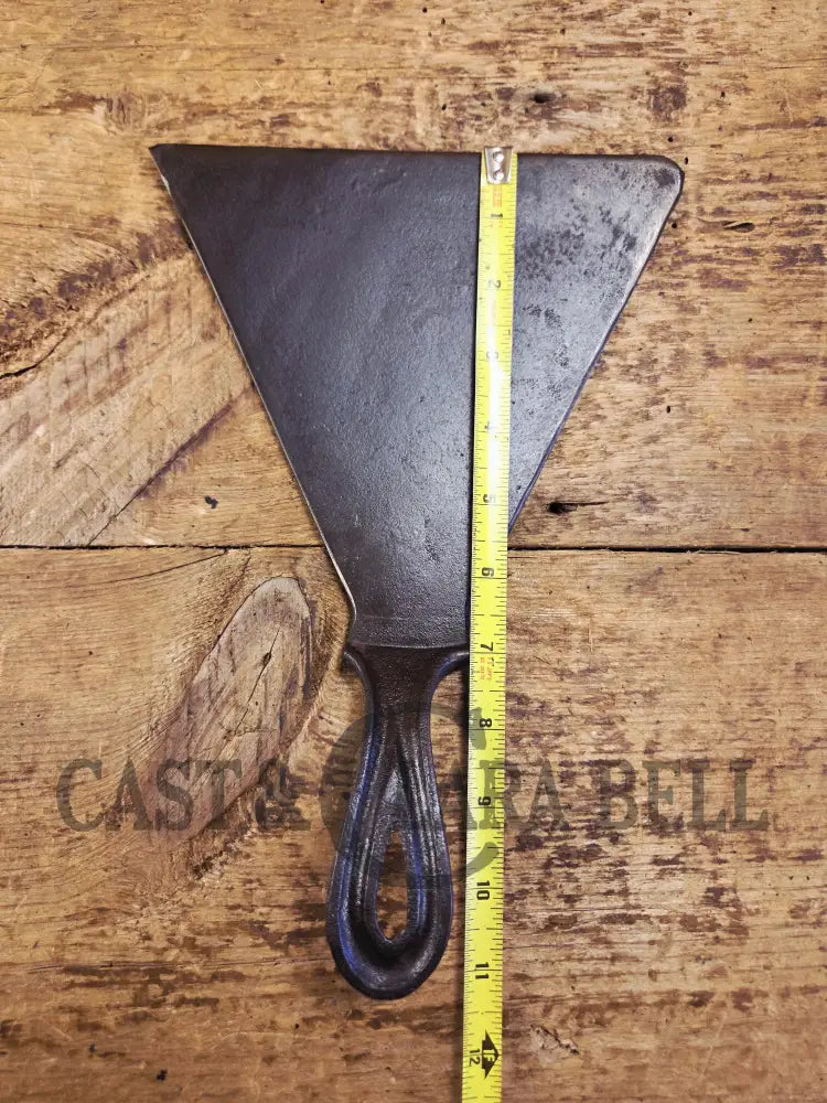 Custom made one of a kind 1800βs #8 Cast Iron Griddle Repurposed into triangular grill spatula. Perfect for the Home