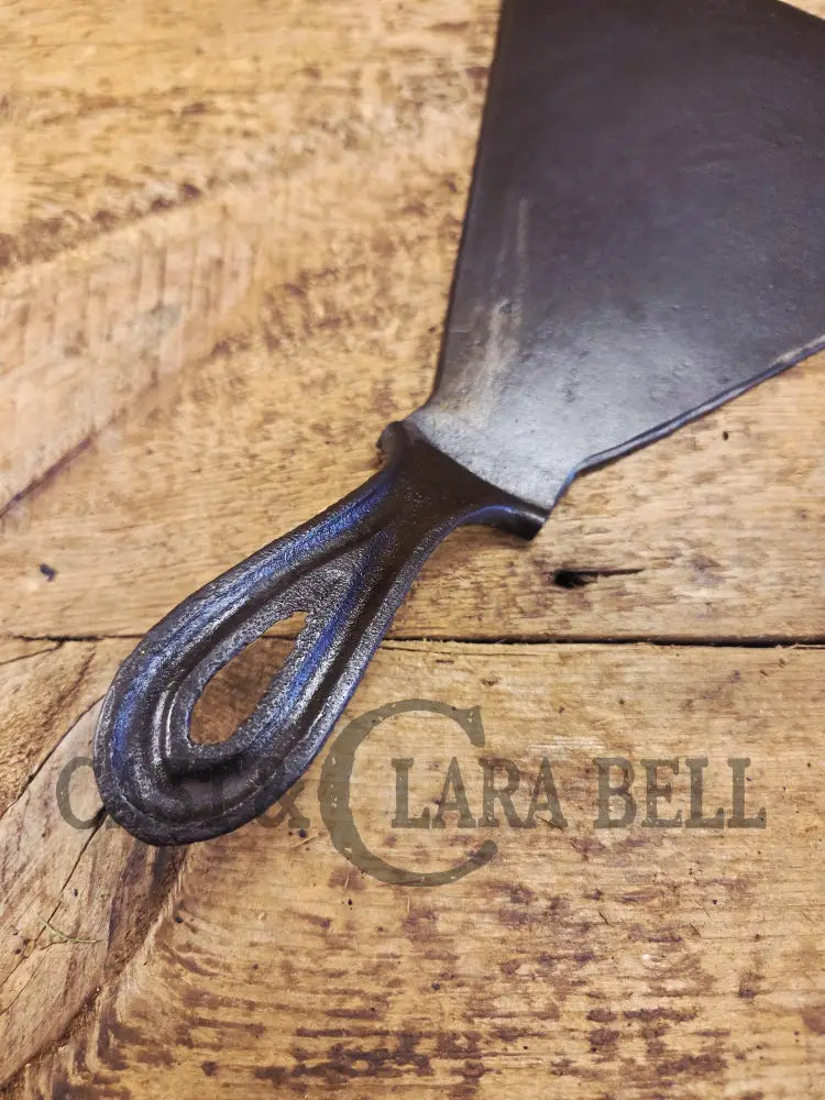 Custom made one of a kind 1800βs #8 Cast Iron Griddle Repurposed into triangular grill spatula. Perfect for the Home