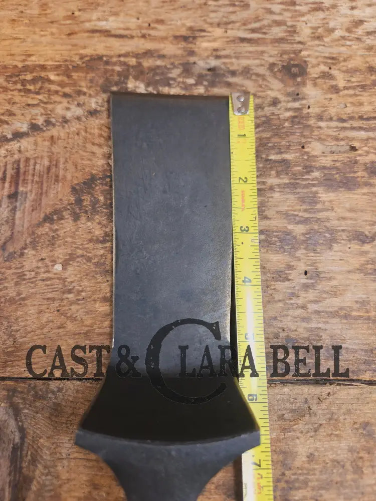 Custom made one of a kind 1940’s Era Lodge repurposed spatula. Turned an ordinary cracked skillet into a grill helper!