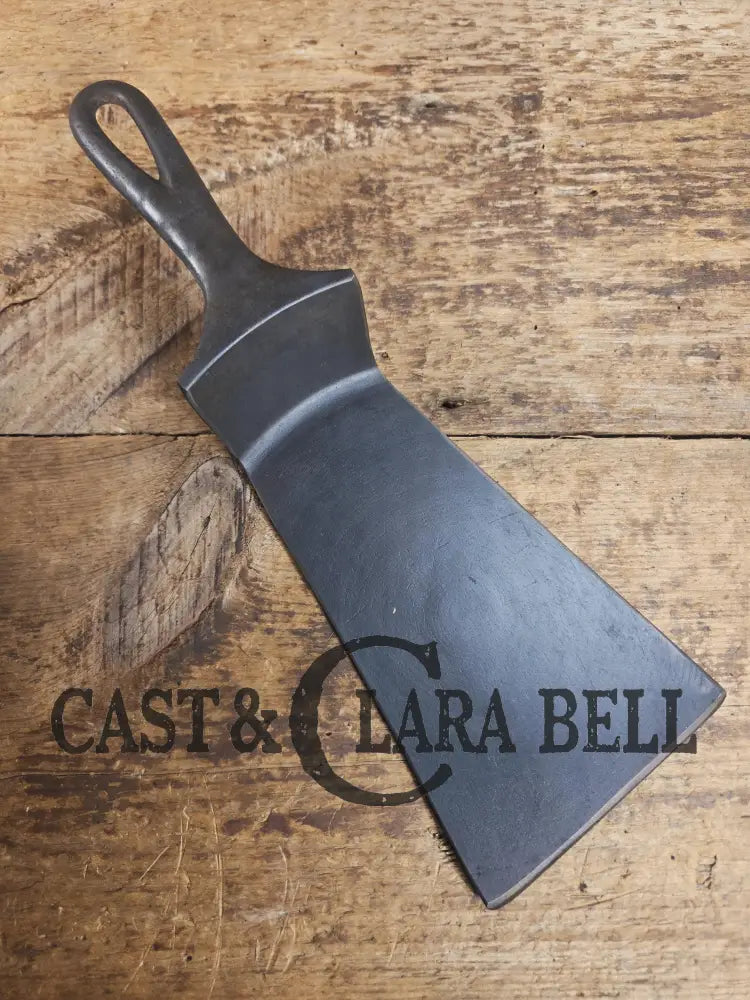 Custom made one of a kind Cast Iron Spatula. Maker unknown likely Wagner but a wonderful gift for the griller in your