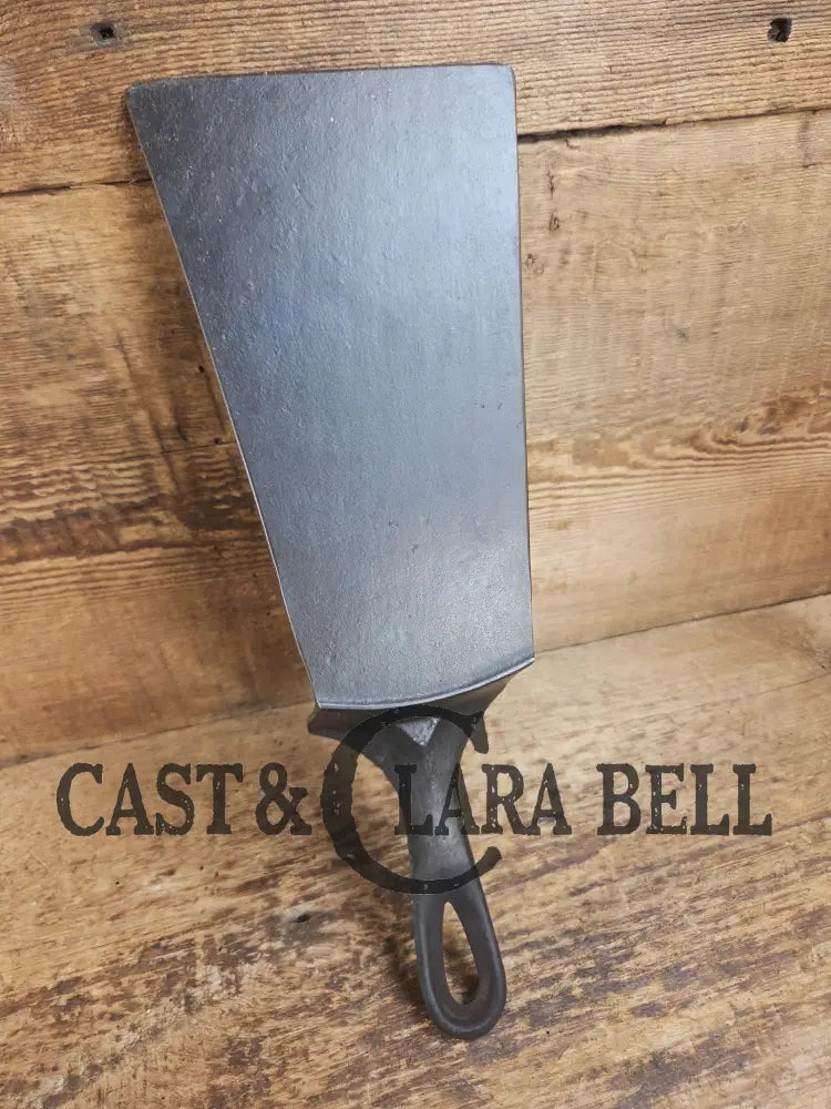 Custom made one of a kind Cast Iron Spatula. Maker unknown likely Wagner but a wonderful gift for the griller in your