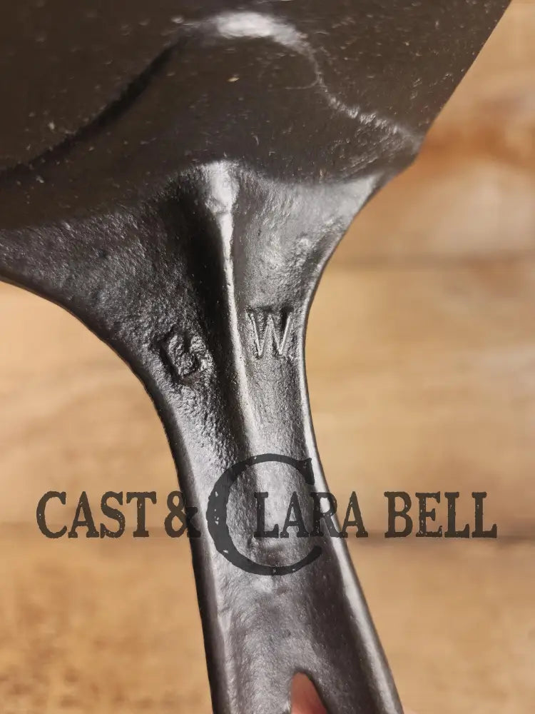 Custom made one of a kind Cast Iron Spatula repurposed from an unknown #8 Skillet. βBWβ initials! SC24 Spatula