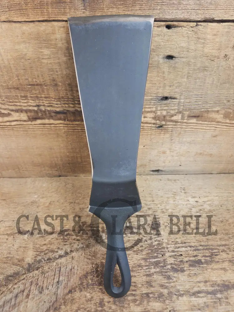 Custom made one of a kind early #9 1900’s Lodge repurposed spatula. Turned an ordinary cracked skillet into a grill