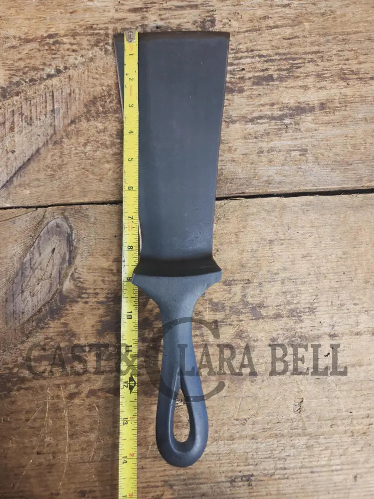 Custom made one of a kind early #9 1900’s Lodge repurposed spatula. Turned an ordinary cracked skillet into a grill