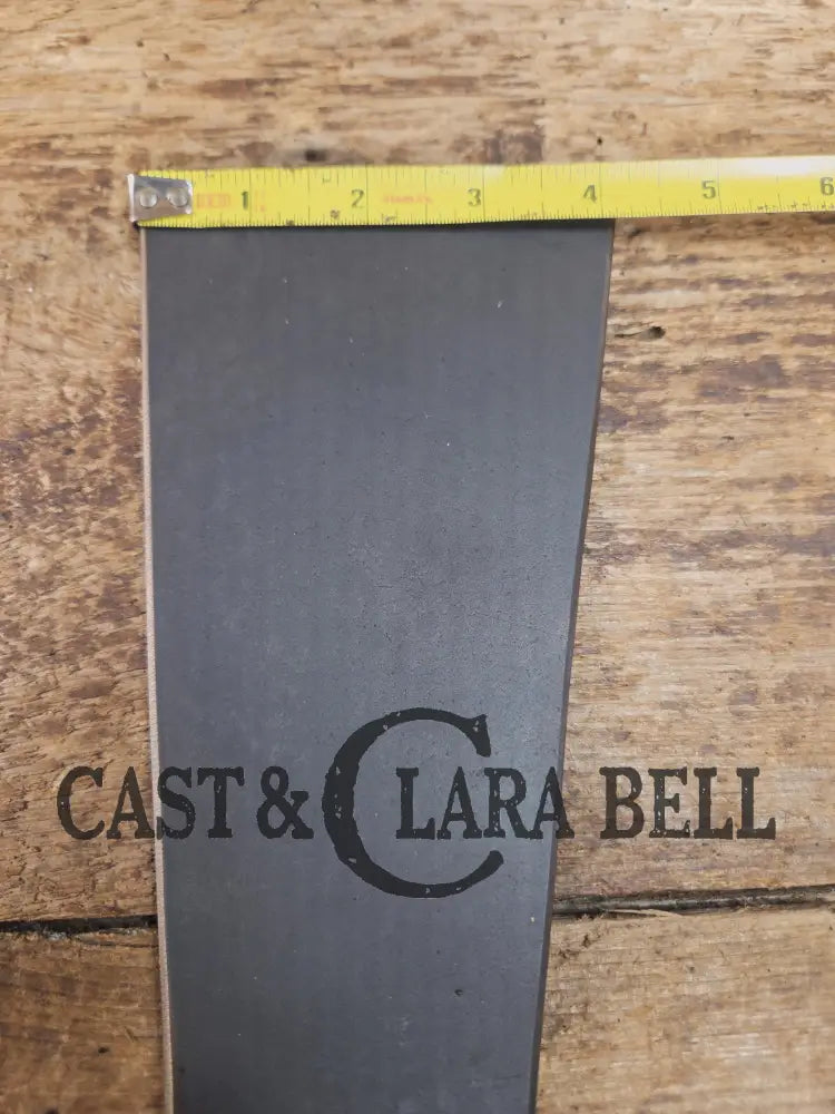 Custom made one of a kind early #9 1900βs Lodge repurposed spatula. Turned an ordinary cracked skillet into a grill