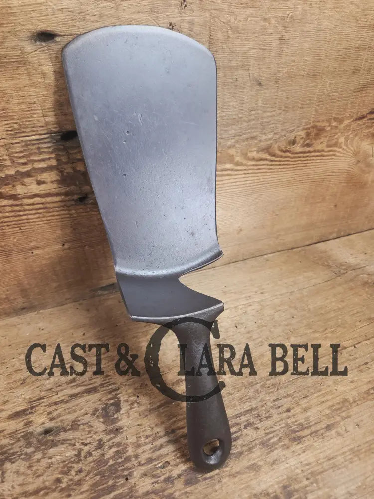 Custom made one of a kind Griswold Good Health #5 repurposed spatula. Turned an ordinary cracked skillet into an