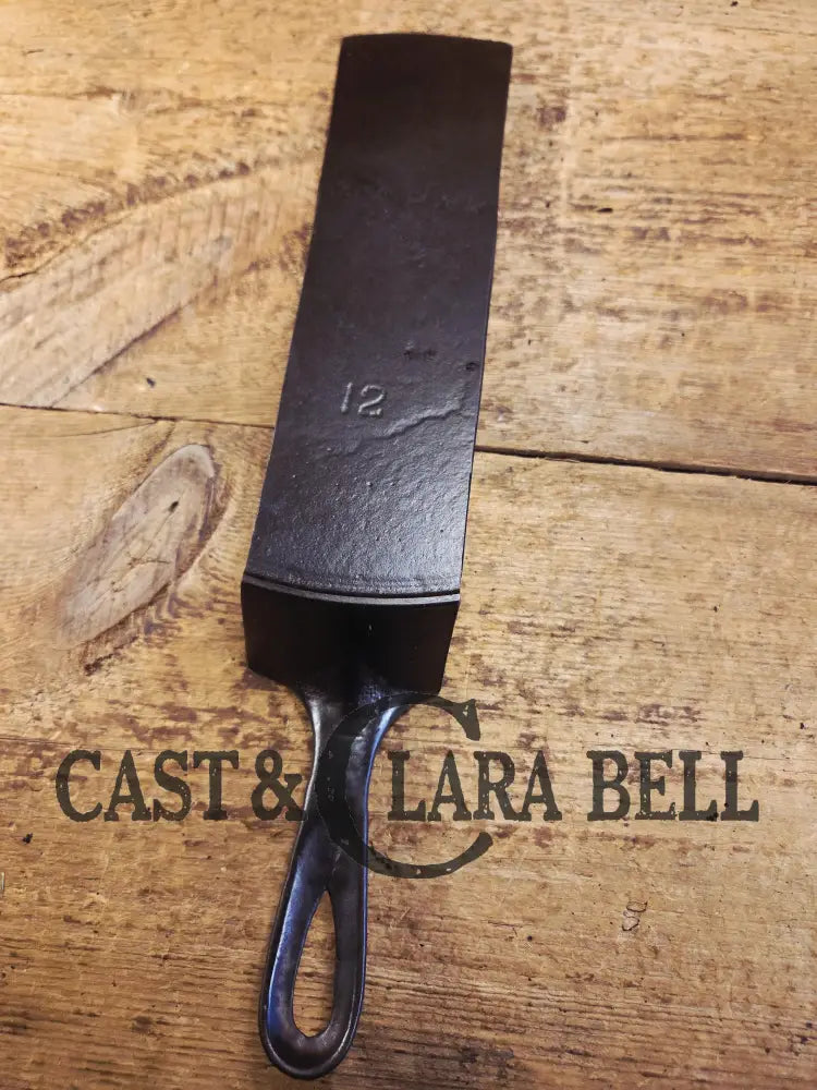 Custom made one of a kind Repurposed #12 Wapak Straight Logo Cast Iron Skillet Spatula. Flared design awesome gift for