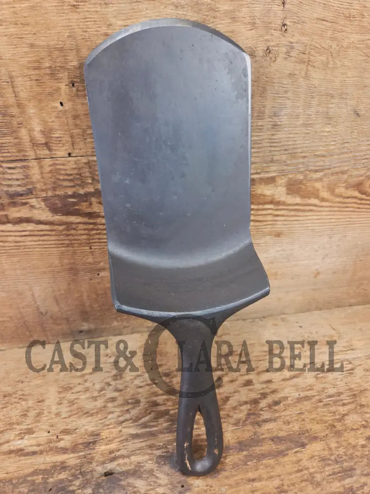 Custom made one of a kind vintage Lodge 5SK 1 repurposed spatula. Turned an ordinary cracked skillet into a grill