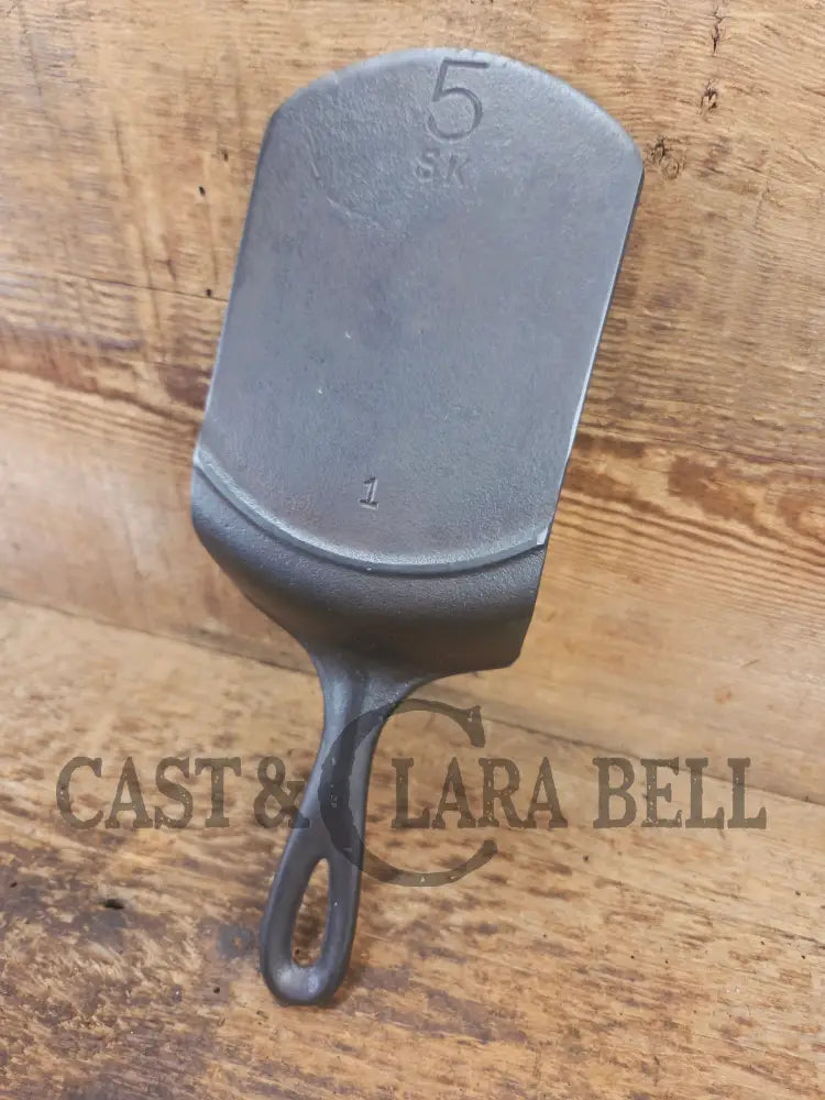 Custom made one of a kind vintage Lodge 5SK 1 repurposed spatula. Turned an ordinary cracked skillet into a grill