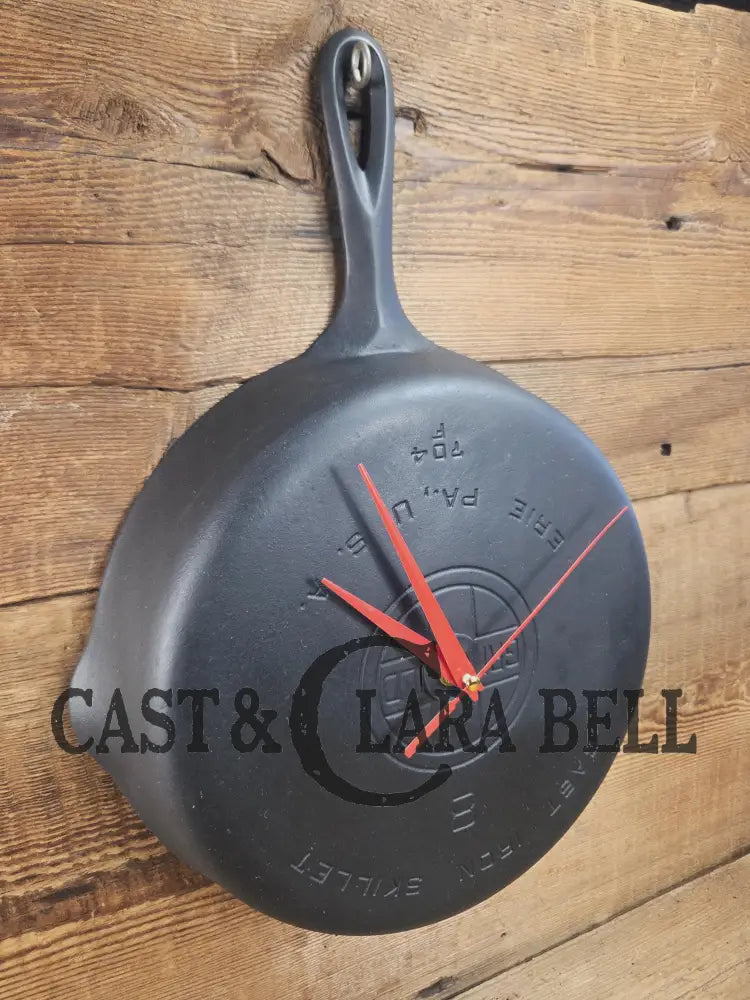 Custom made wall hanging Griswold Clock. Repurposed from cracked skillet. Comes with interchangeable clock mechanics.