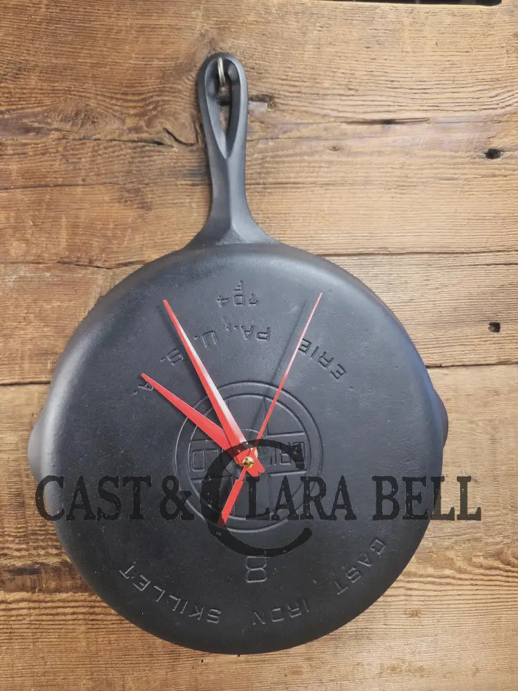 Custom made wall hanging Griswold Clock. Repurposed from cracked skillet. Comes with interchangeable clock mechanics.
