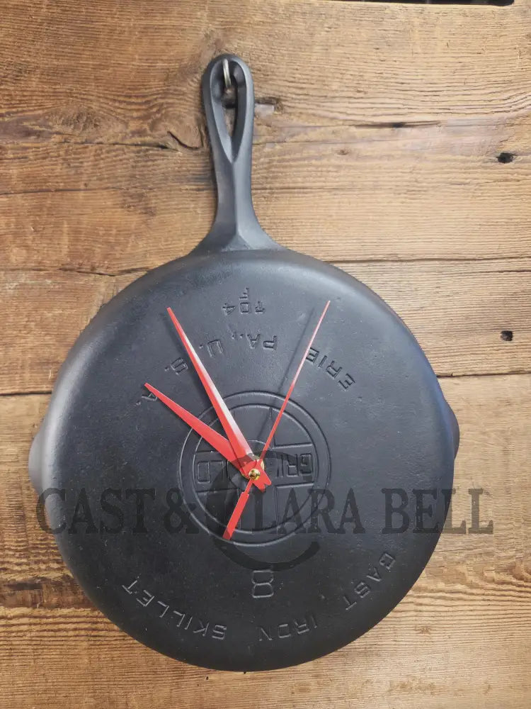 Custom made wall hanging Griswold Clock. Repurposed from cracked skillet. Comes with interchangeable clock mechanics.