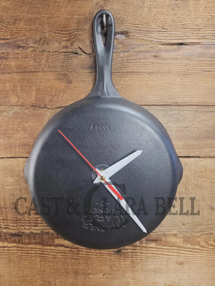 Custom made wall hanging Griswold Clock. Repurposed from cracked skillet. Comes with interchangeable clock mechanics.