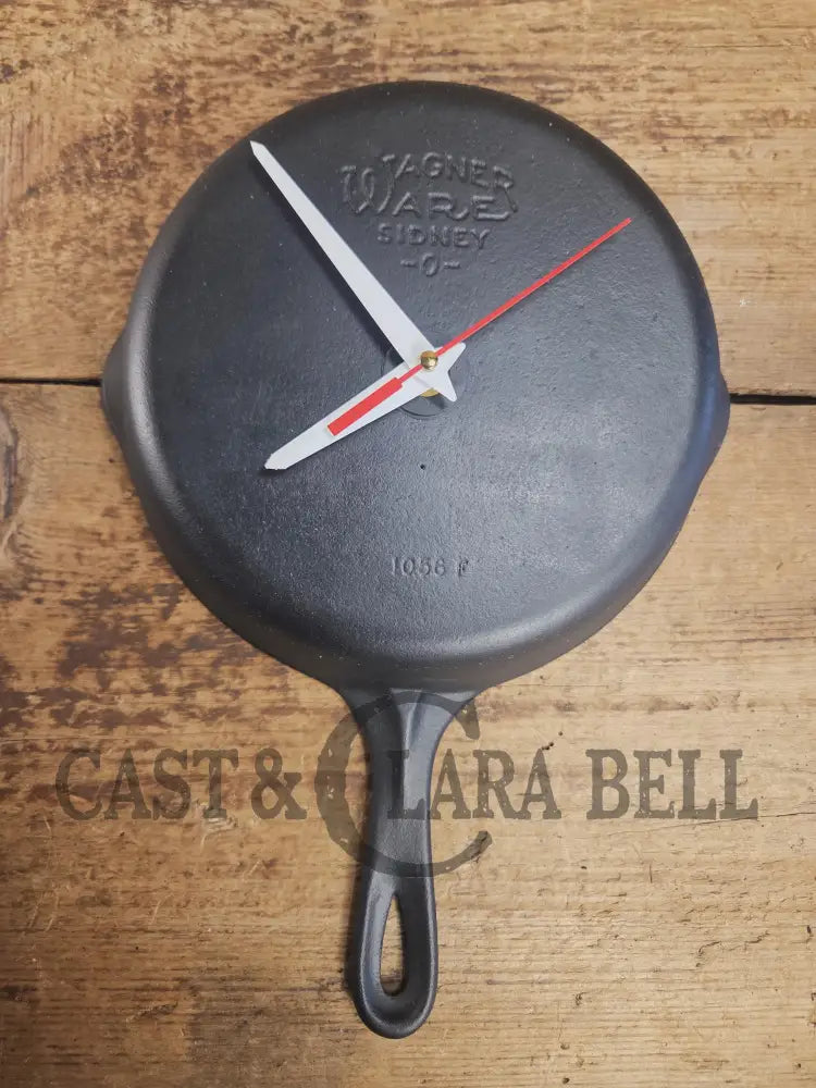 Custom made wall hanging Wagner Clock. Repurposed from cracked skillet. Comes with interchangeable clock mechanics.