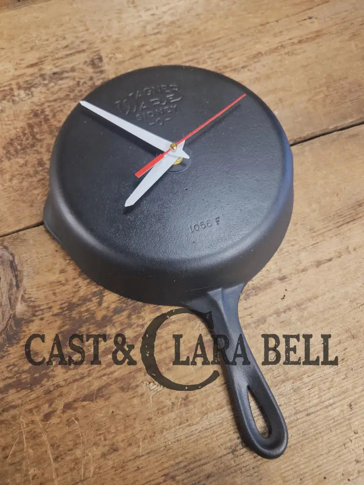 Custom made wall hanging Wagner Clock. Repurposed from cracked skillet. Comes with interchangeable clock mechanics.