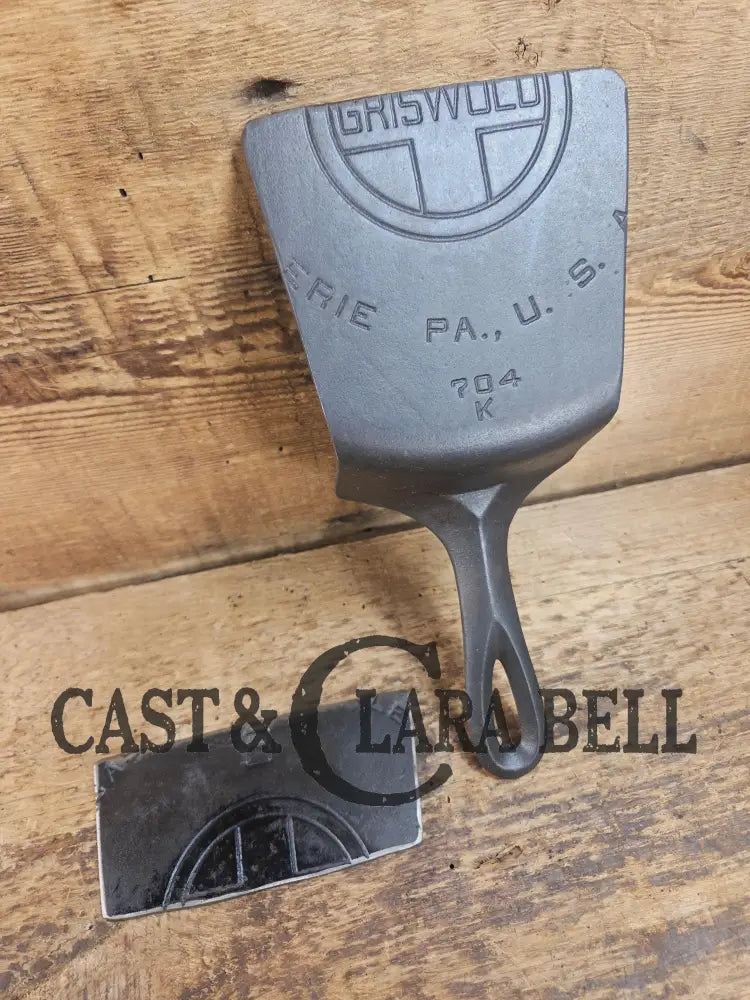 Custom Repurposed Burger Spatula AND grill scraper. Made from a center cracked Griswold 704 skillet. Awesome for the