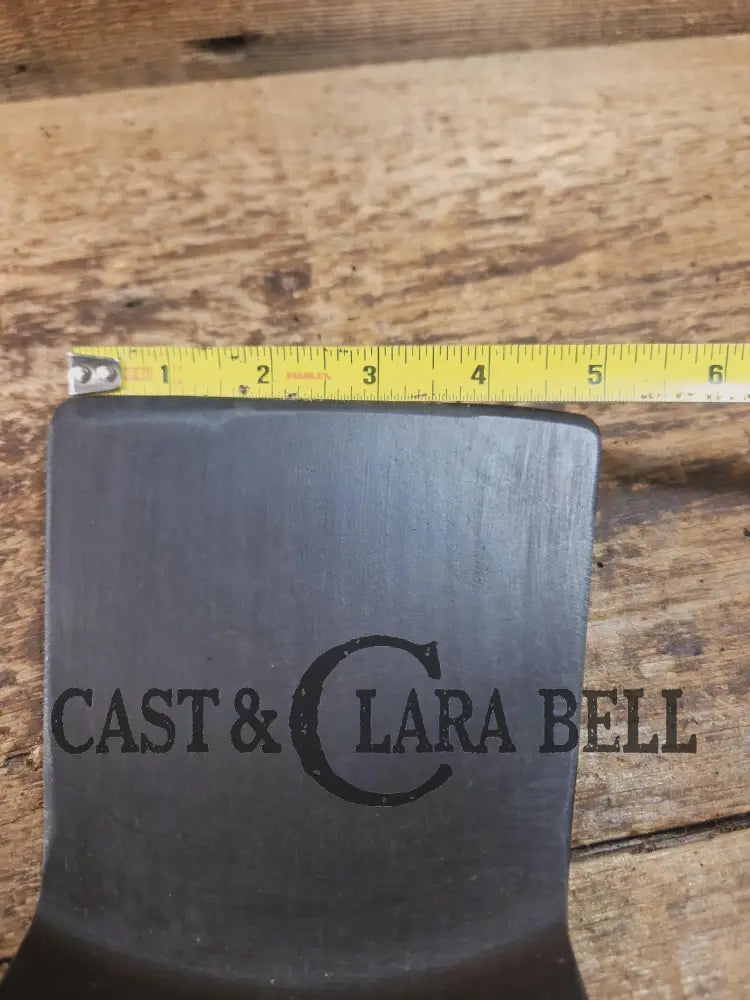 Custom Repurposed Burger Spatula AND grill scraper. Made from a center cracked Griswold 704 skillet. Awesome for the