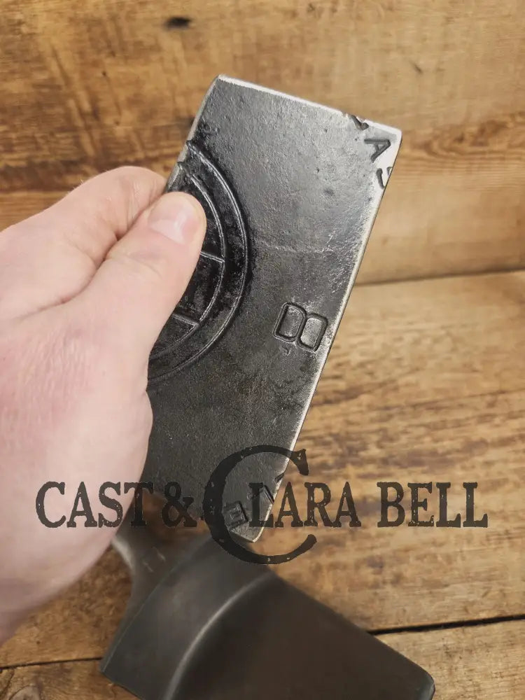 Custom Repurposed Burger Spatula AND grill scraper. Made from a center cracked Griswold 704 skillet. Awesome for the