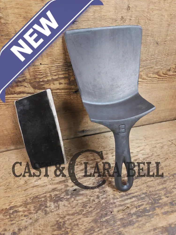 Custom Repurposed Burger Spatula AND grill scraper. Made from a center cracked Griswold 704 skillet. Awesome for the