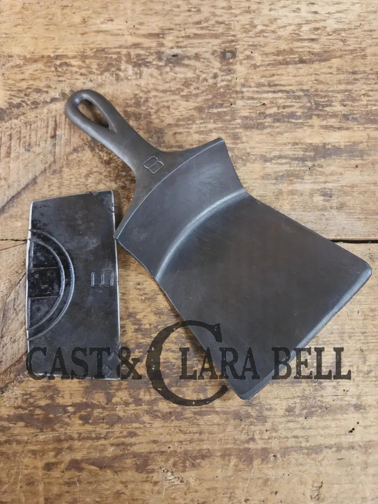 Custom Repurposed Burger Spatula AND grill scraper. Made from a center cracked Griswold 704 skillet. Awesome for the