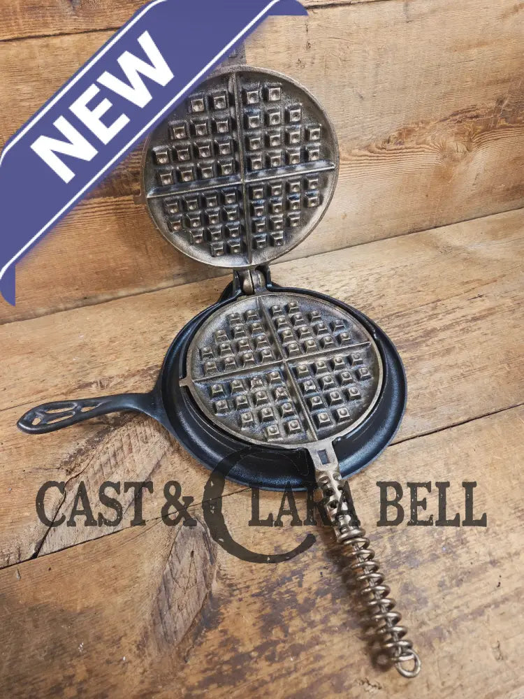 For the eclectic enthusiast!! 1920’s Griswold #8 Waffle Iron 885/886 with Matching Low Base 975. Plated paddles Black