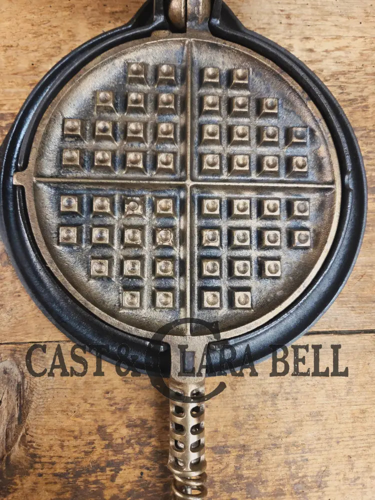 For the eclectic enthusiast!! 1920βs Griswold #8 Waffle Iron 885/886 with Matching Low Base 975. Plated paddles Black