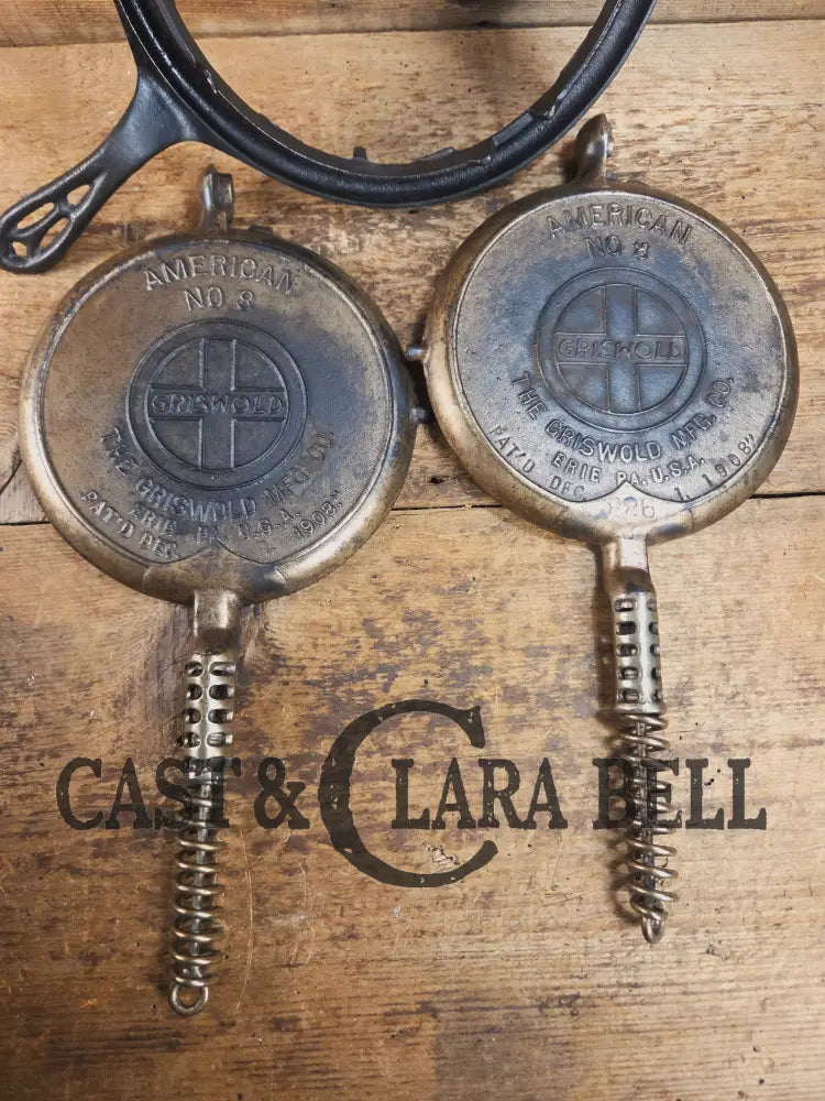 For the eclectic enthusiast!! 1920βs Griswold #8 Waffle Iron 885/886 with Matching Low Base 975. Plated paddles Black