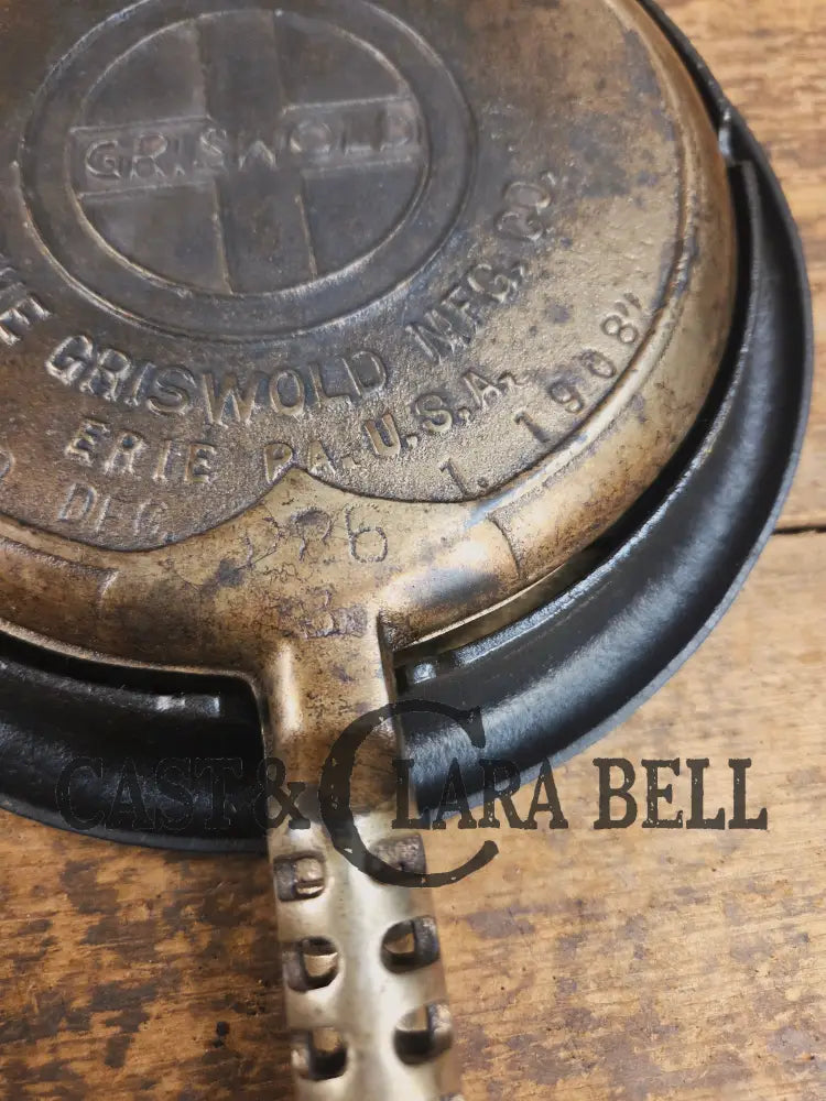 For the eclectic enthusiast!! 1920βs Griswold #8 Waffle Iron 885/886 with Matching Low Base 975. Plated paddles Black