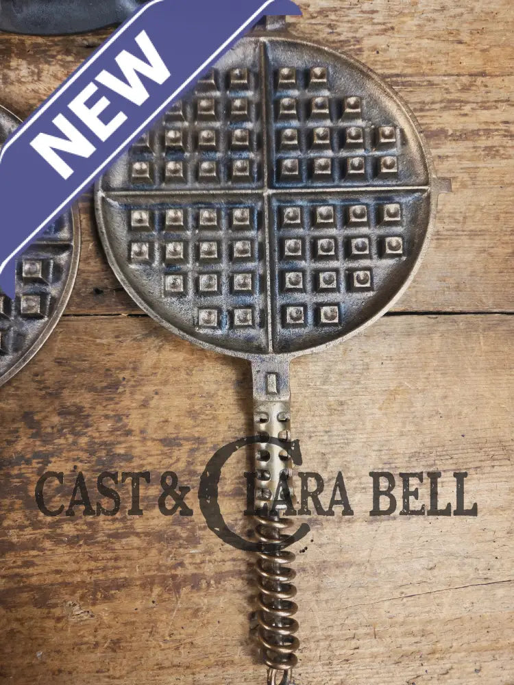 For the eclectic enthusiast!! 1920’s Griswold #8 Waffle Iron 885/886 with Matching Low Base 975. Plated paddles Black