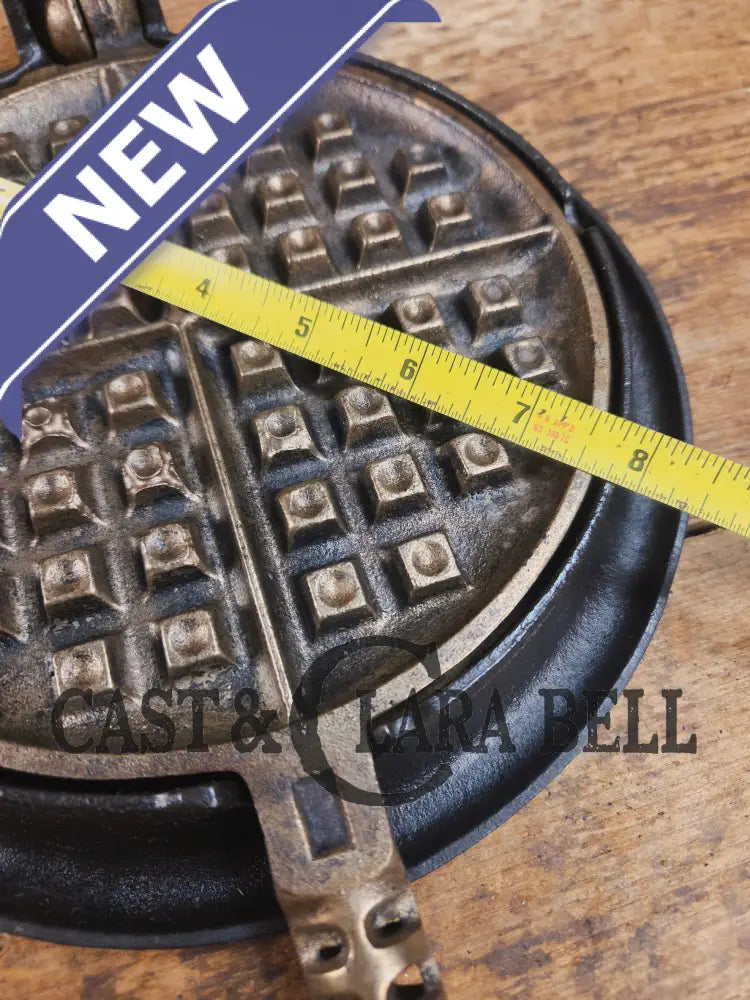 For the eclectic enthusiast!! 1920’s Griswold #8 Waffle Iron 885/886 with Matching Low Base 975. Plated paddles Black