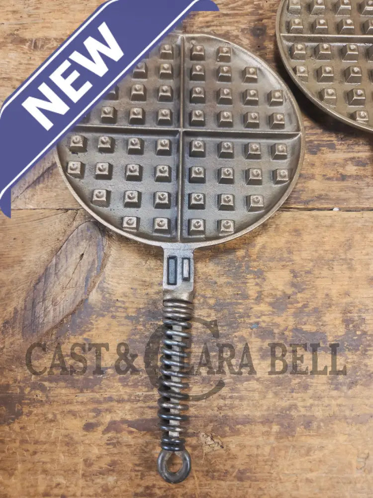 For the eclectic enthusiast!! 1930’s Era Wagner Tall Base Waffle Iron with Nickel Finish Paddles! Really cool patina!