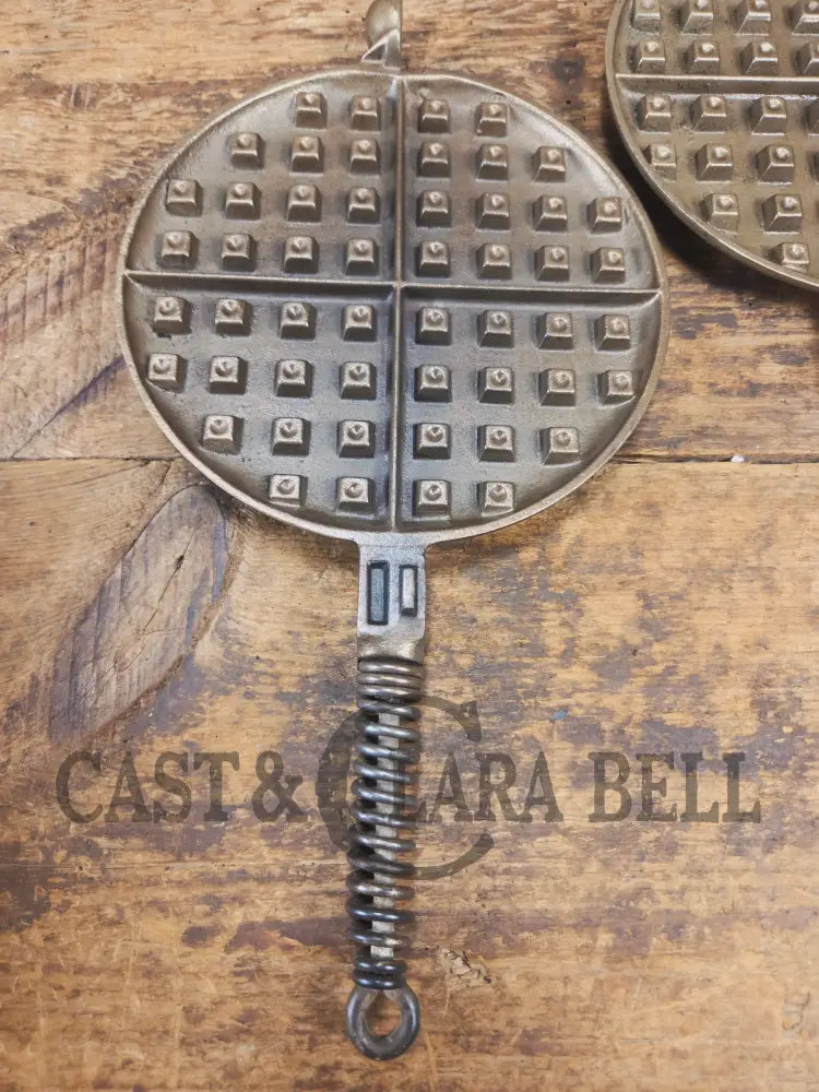 For the eclectic enthusiast!! 1930’s Era Wagner Tall Base Waffle Iron with Nickel Finish Paddles! Really cool patina!