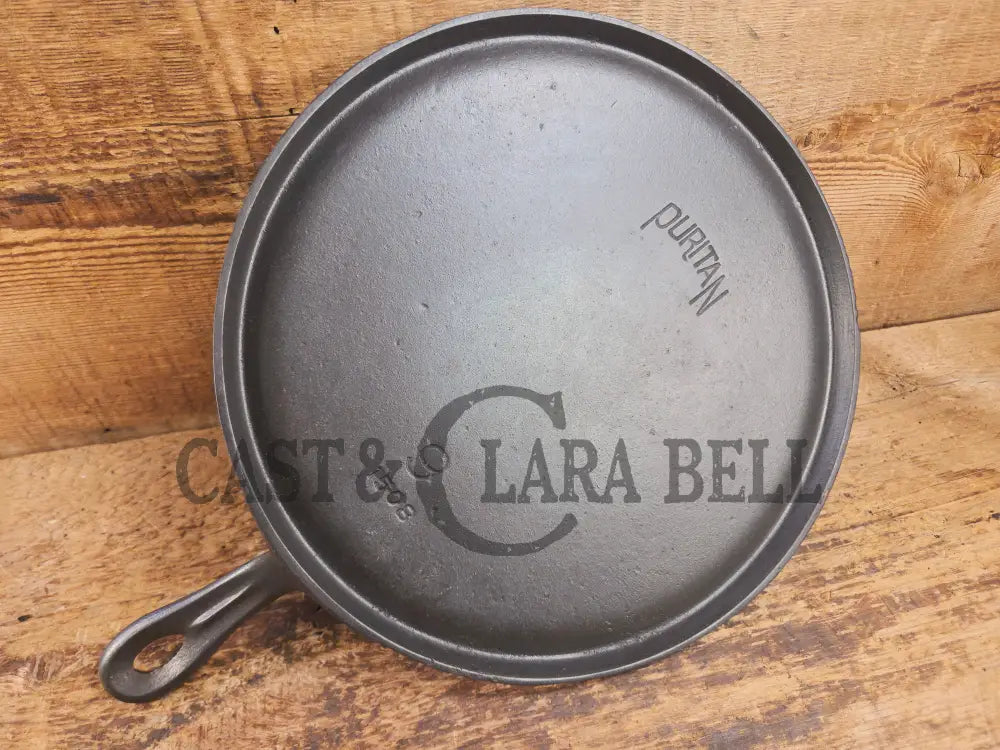 Gorgeous and not often seen #9 Puritan round griddle by Griswold. Perfect for everyday pancakes grilled cheese or oven