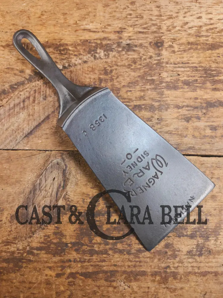 Gorgeous custom made Wagner Cast Iron Skillet Spatula. From a ’Double Logo’ Wagner / National Skillet. AMAZING