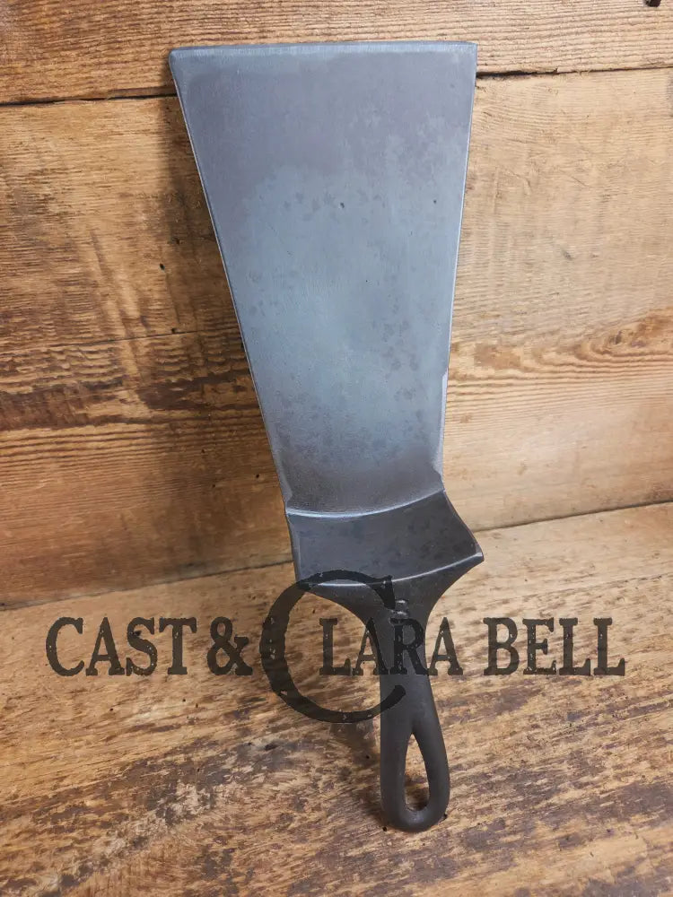 Gorgeous custom made Wagner Cast Iron Skillet Spatula. From a ’Double Logo’ Wagner / National Skillet. AMAZING