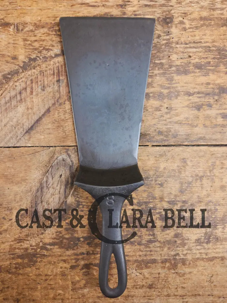 Gorgeous custom made Wagner Cast Iron Skillet Spatula. From a ’Double Logo’ Wagner / National Skillet. AMAZING