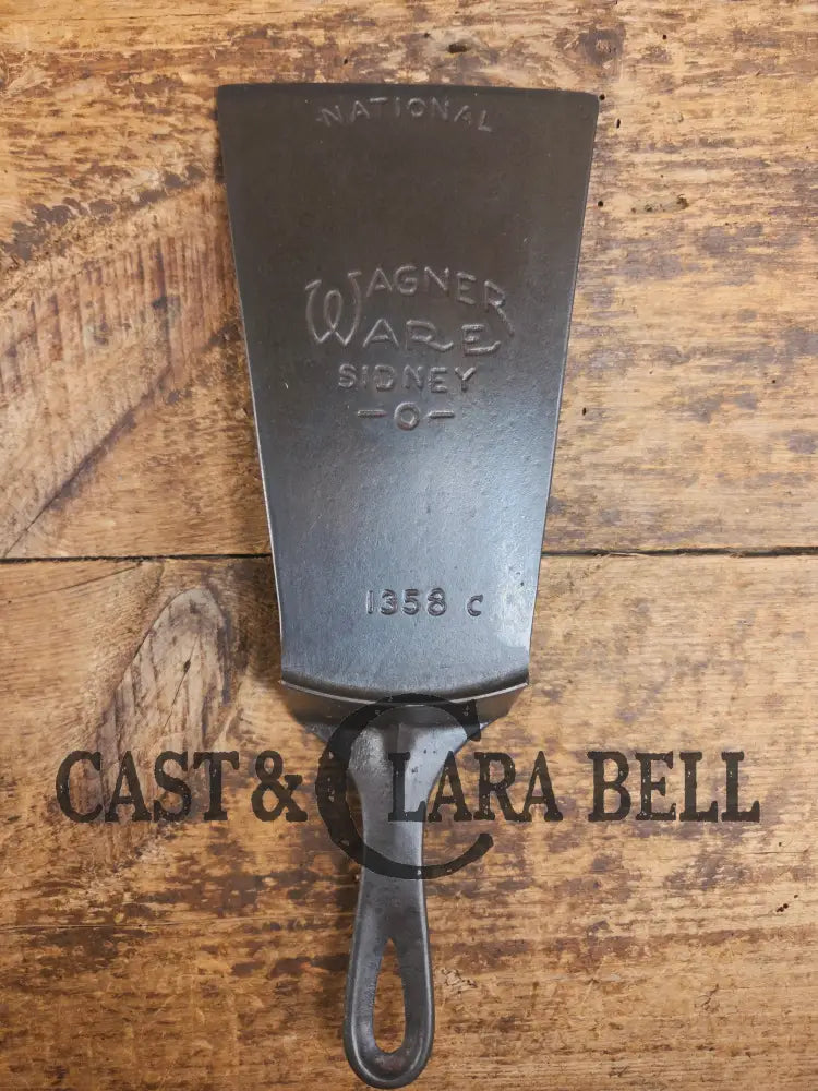 Gorgeous custom made Wagner Cast Iron Skillet Spatula. From a ’Double Logo’ Wagner / National Skillet. AMAZING