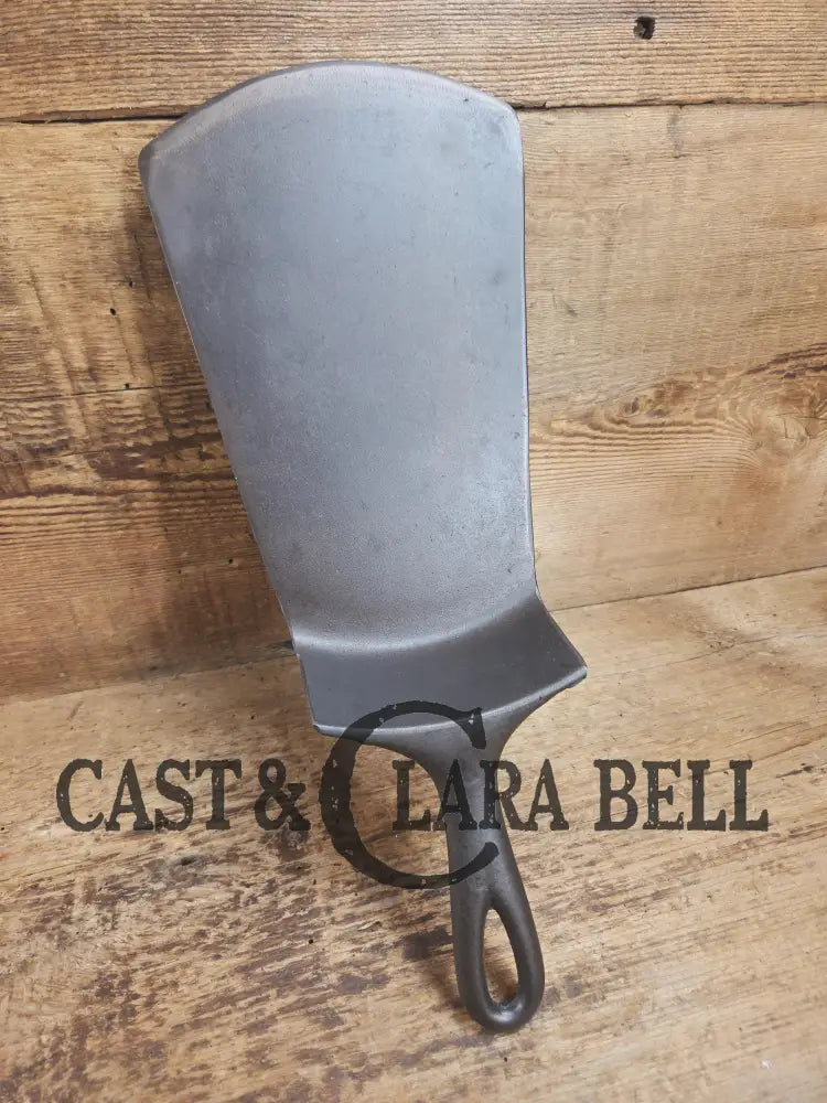 Gorgeous custom made Wagner Cast Iron Skillet Spatula. From an 1800’s ’Double arc’ Wagner Skillet. AMAZING craftmanship
