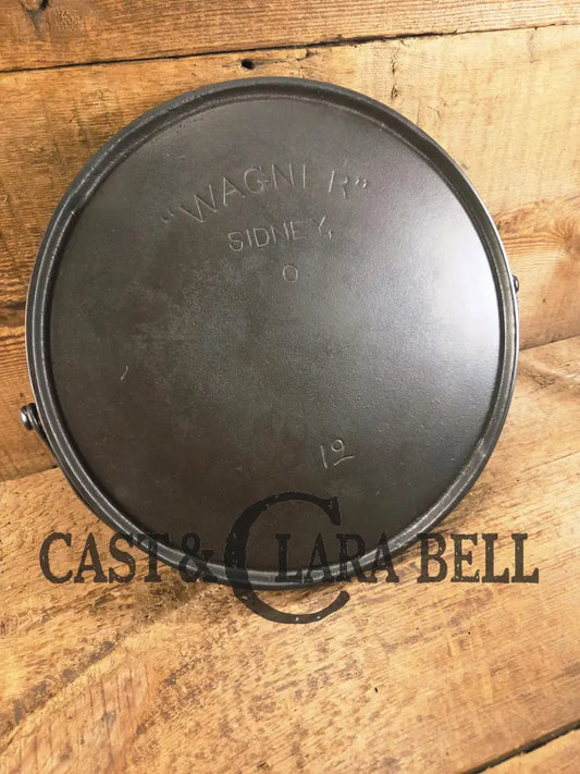 Gorgeous Griddle! Hard to Find early 1900βs Wagner βArcβ Logo #12 Bailed. Awesome daily user and in mint condition.
