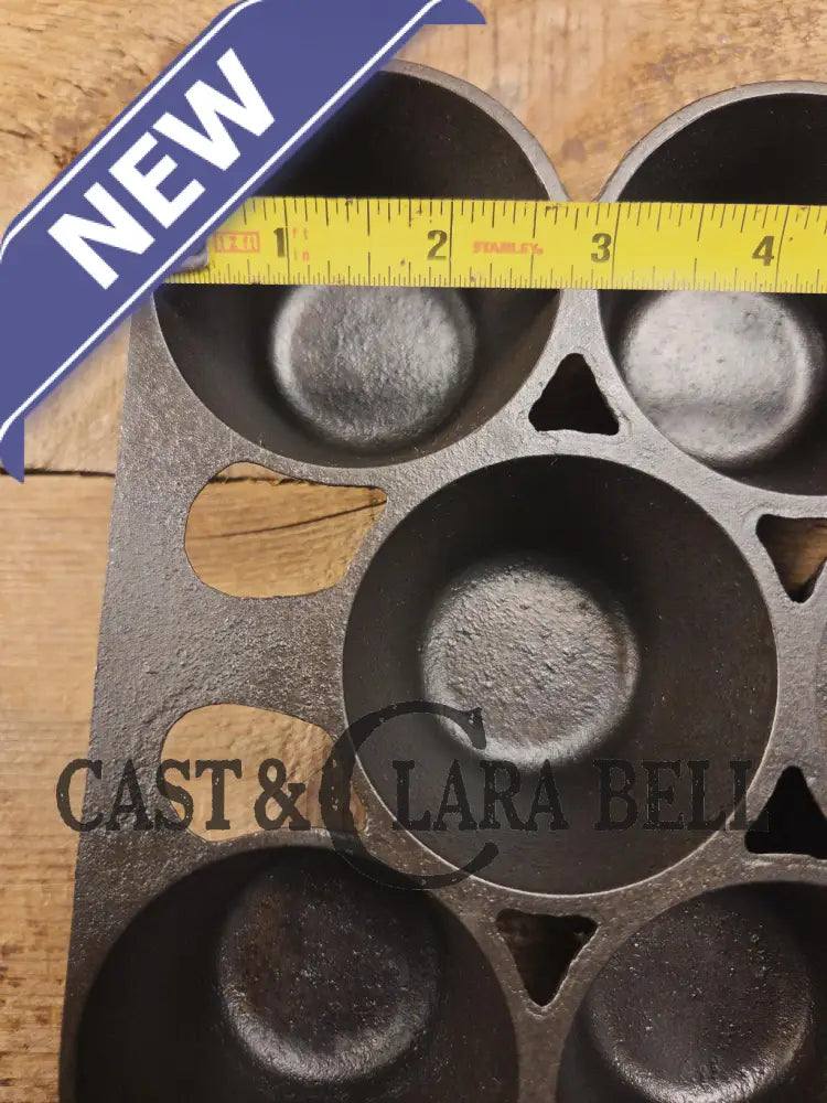 Great collectors piece! Griswold made Sears and Roebuck & Co. ’Best Made’ No. 10 Popover pan. Very cool! Bakeware