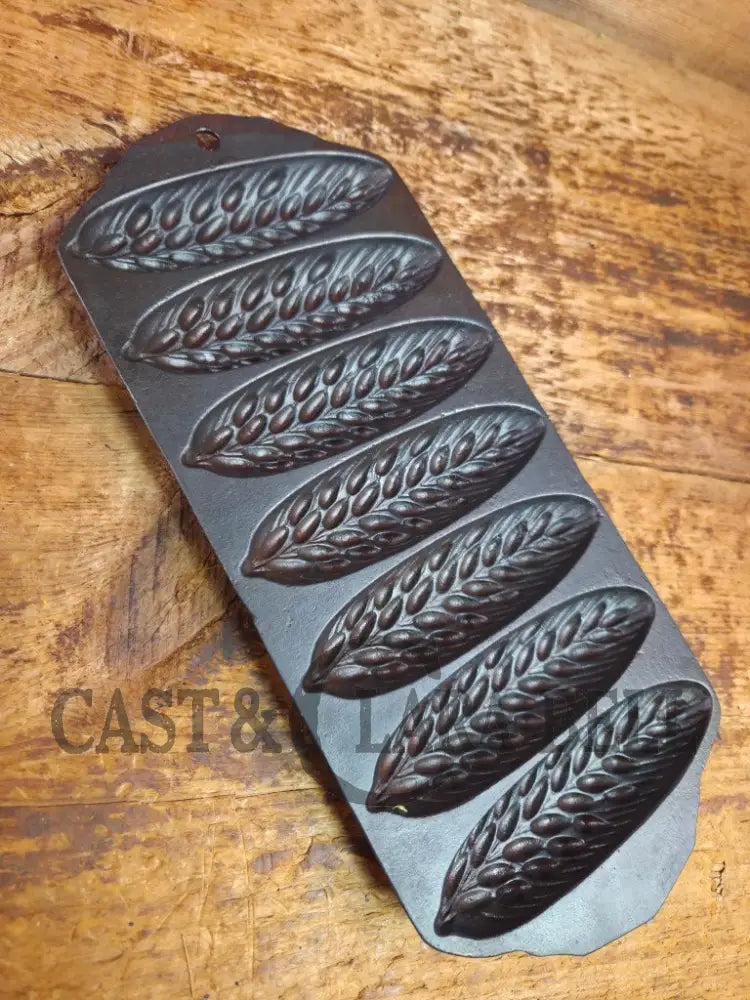 Great collectors piece! Griswold made Sears and Roebuck & Co. βBest Madeβ No. 273 Wheat Corn Stick Pan Bakeware