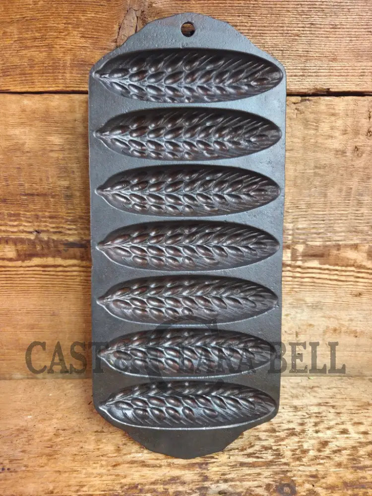 Great collectors piece! Griswold made Sears and Roebuck & Co. βBest Madeβ No. 273 Wheat Corn Stick Pan Bakeware