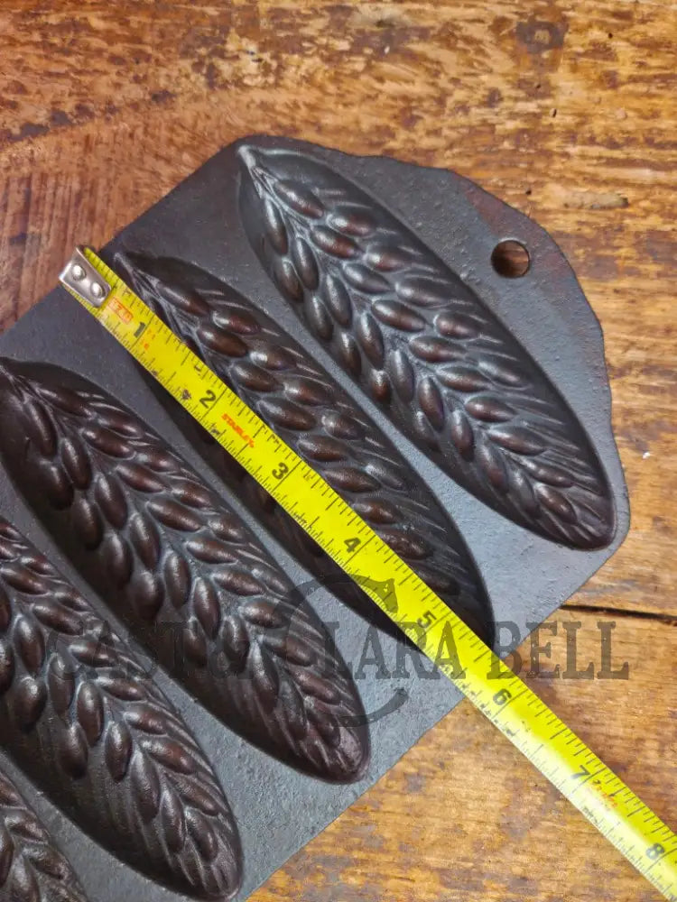 Great collectors piece! Griswold made Sears and Roebuck & Co. βBest Madeβ No. 273 Wheat Corn Stick Pan Bakeware