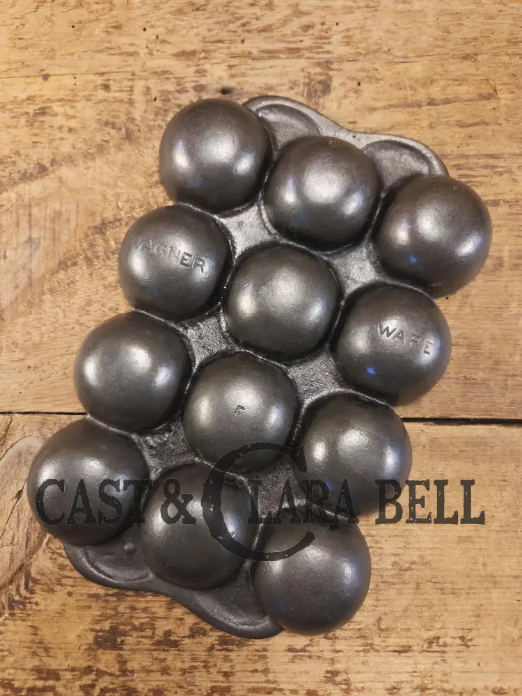 Great gift and tough to find! 1930βs Fully Marked Wagner βgolf ballβ brownie pan. Closed frame βFβ style gem pan