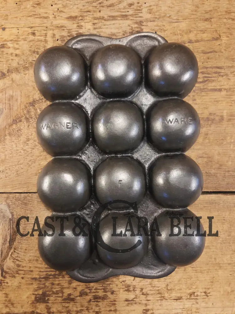 Great gift and tough to find! 1930βs Fully Marked Wagner βgolf ballβ brownie pan. Closed frame βFβ style gem pan